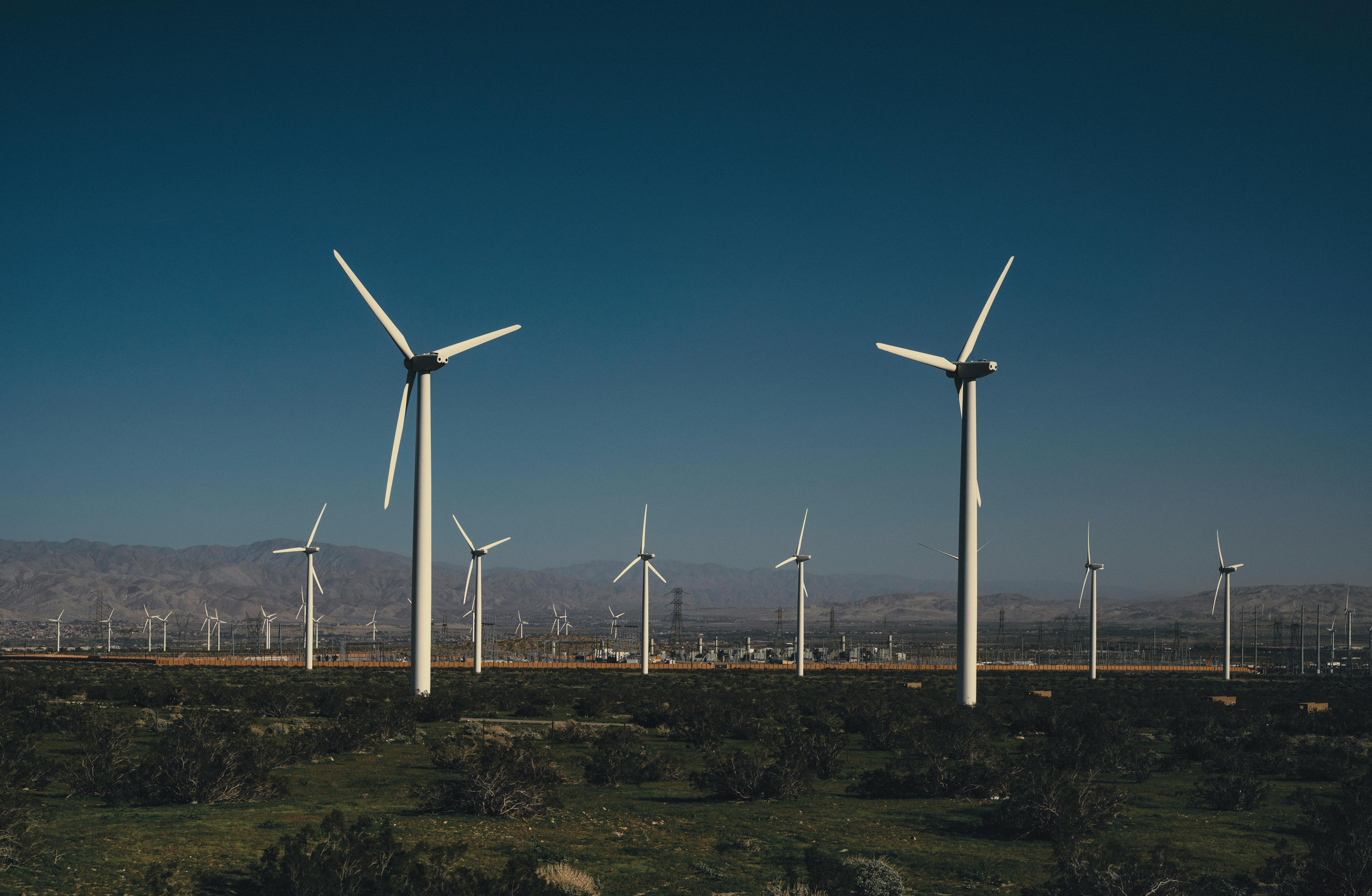 Wind turbines generating renewable energy on a commercial site